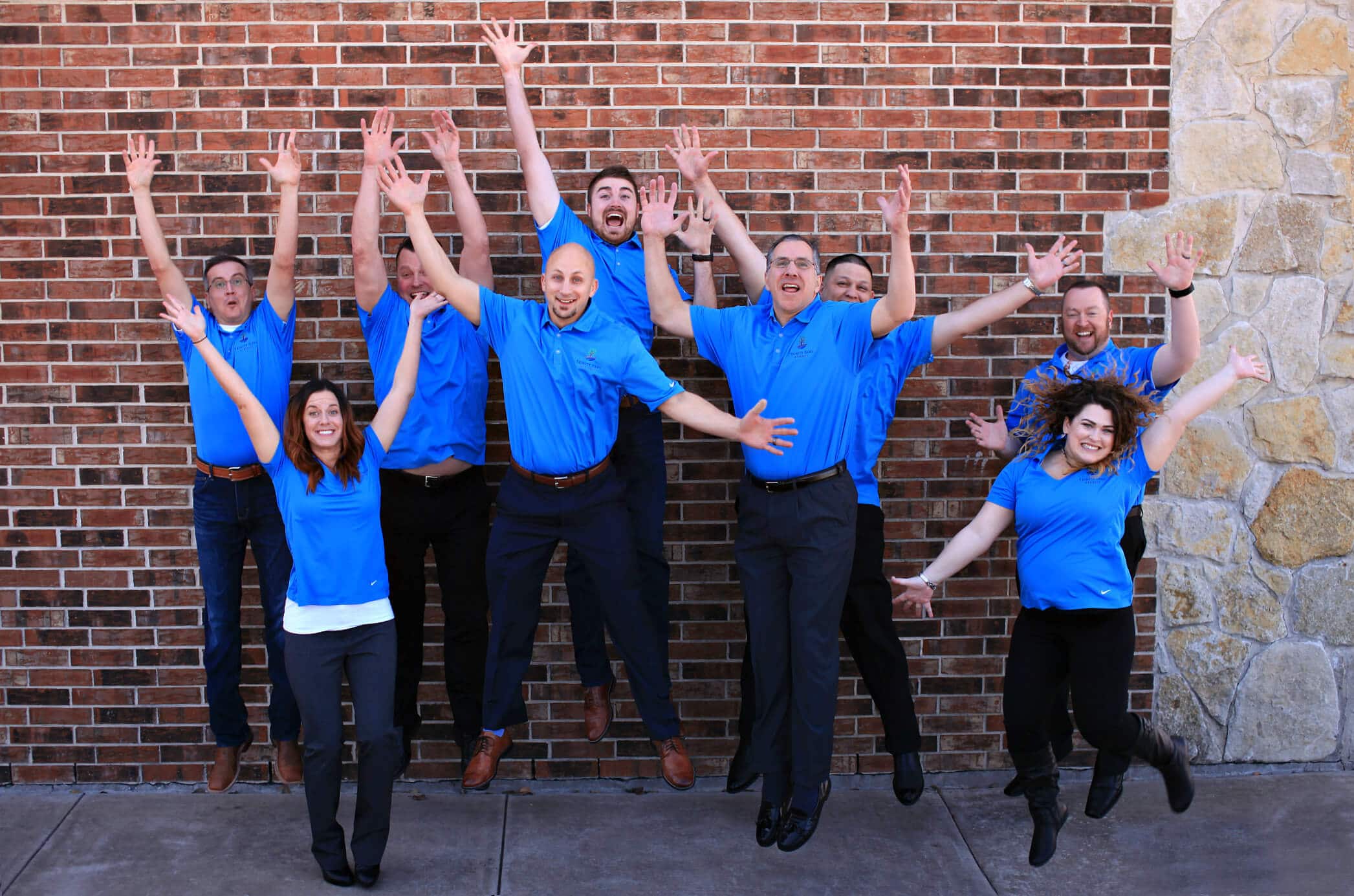 find a loan officer group jumping in the air