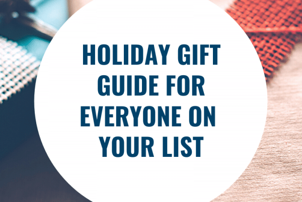 Gifts wrapped with white cirle and dark blue test "Holiday Gift Guide For Everyone On Your List"